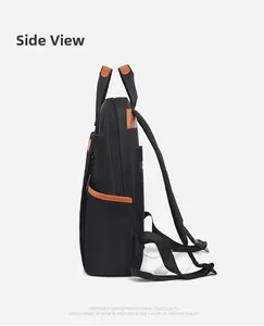 Détail latéral du sac à dos d'affaires noir en oxford avec finitions en cuir brun