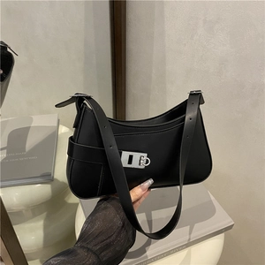 Minimalist black hobo shoulder bag with matte leather finish and silver buckle detail
