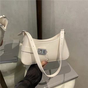 Minimalist cream white hobo shoulder bag with silver buckle and adjustable strap