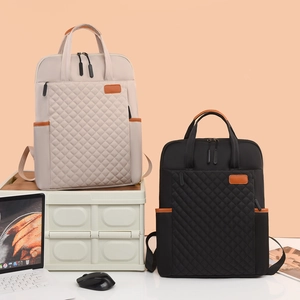 Sacs à dos d'affaires matelassés en noir et beige pour ordinateur et voyage de loisirs