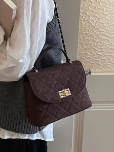 Brown quilted crossbody bag with gold twist lock and metal chain strap for women