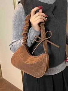 Brown leopard print hobo shoulder bag with scrunchie handle and decorative side bow