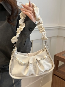Chic cream pleated cloud shoulder bag with pearl floral chain and ruffled strap