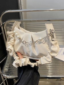 Chic beige ruched cloud shoulder bag with decorative pearl and floral metal chain