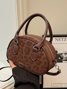 Brown suede boston bag with dark leopard print and creative cat logo detail