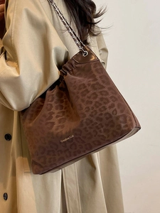 Retro leopard print tote bag with metal chain strap and creative cat logo detail