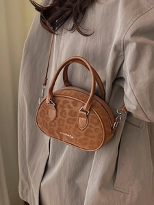 Brown leopard print mini Boston bag with suede texture and crossbody strap for women