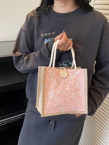 Pink linen floral embroidered tote bag with white rope handles for daily commute