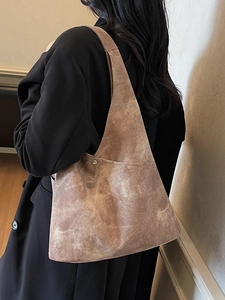 Large vintage washed canvas hobo shoulder bag with a stylish minimalist silhouette
