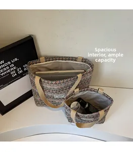 Internal view of ethnic canvas tote showing large capacity for books and toiletries