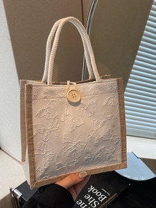 Fashionable jacquard butterfly tote bag with jute trim and decorative wooden button