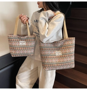 Detail of bohemian canvas tote bags with vintage geometric prints in two sizes