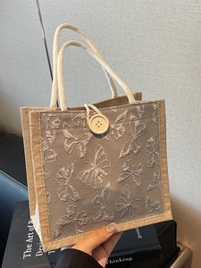 Minimalist canvas tote bag with 3D butterfly relief and woven rope handles for women