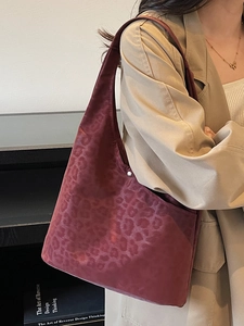 Vintage large burgundy tote bag with leopard print texture for stylish office commute
