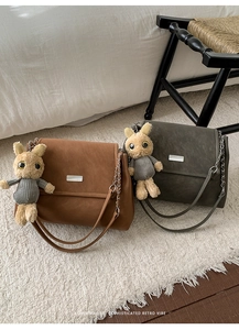Retro aesthetic matte leather chain bags in caramel and grey with cute plush bunny pendants