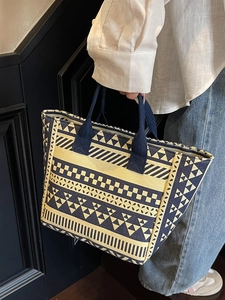 Large geometric pattern canvas tote bag with navy and white woven texture for daily use
