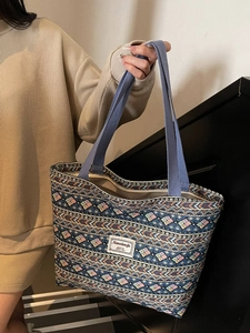 Ethnic style woven tote bag with colorful geometric patterns for women daily commuting