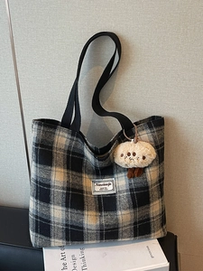 Large capacity black and white checkered tote bag with plush mushroom charm and fabric straps