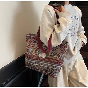 Detailed close-up of ethnic style large capacity tote bag with vintage jacquard pattern