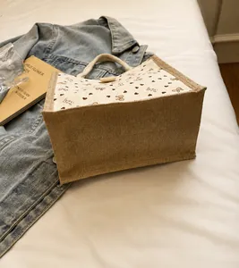 Linen and corduroy tote bag with butterfly prints in a cozy lifestyle setting