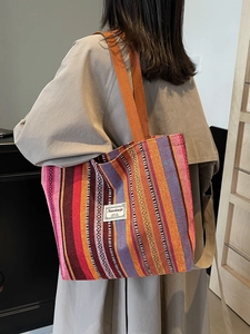 Ethnic bohemian striped woven tote bag with wide orange shoulder strap and large capacity