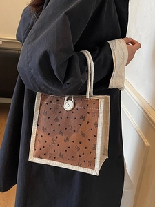 Sac à déjeuner en lin avec motifs de cœur et anse en corde de coton sur l'épaule