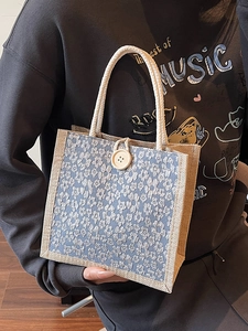 Linen tote lunch bag with floral lace overlay and decorative wooden button closure