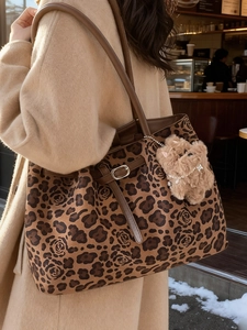 Large leopard rose print tote bag with brown leather straps and puppy charm