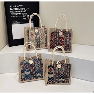 Detailed view of woven ethnic tote bags with jute texture and large wooden button closures