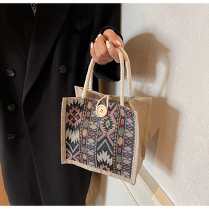 Ethnic pattern tote bag detail with woven hemp fabric and large wooden button closure