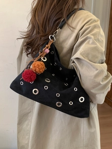 Vintage black suede underarm bag with silver hollow-out metal holes and colorful pompom charm