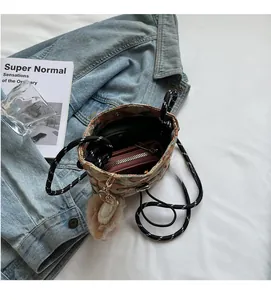 Internal view of the colorful woven bucket bag showing its spacious capacity and contents
