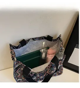 Spacious interior of ethnic tote bag showing capacity for tablet and daily items