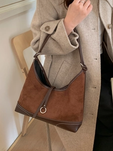 Brown vintage matte suede tote bag with contrast stitching and metal ring detail