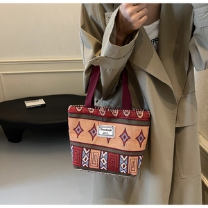Detail of vintage ethnic geometric pattern on large canvas bucket tote bag