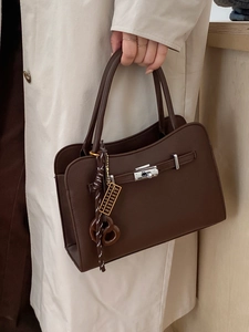 Retro brown litchi pattern leather crossbody bag with silver lock and abacus charm
