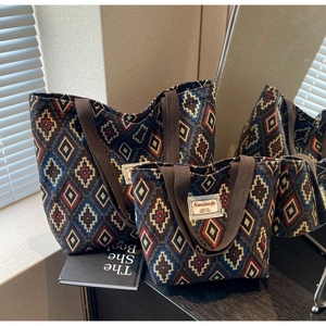 Detail of bohemian geometric jacquard tote bags set in large and mini sizes