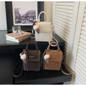 Three suede leather crossbody bags in beige and brown with cute ice cream charms