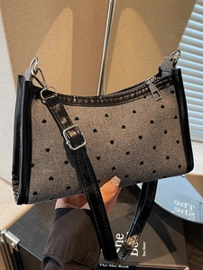 French style underarm bag with black heart pattern and leather straps for women