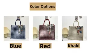 Detailed view of large capacity houndstooth tote bags in blue, red, and khaki colors