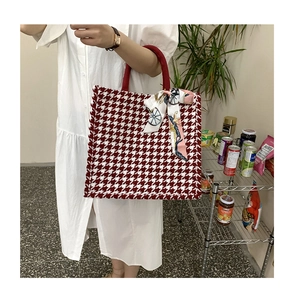 Large capacity red houndstooth tote bag detail with silk scarf on the top handle