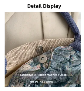 Detail of floral jacquard tote bag with silver magnetic snap and woven rope handle