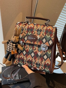 Retro colorful checkered backpack with brown leather straps and cute bunny charm