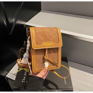 Brown faux leather crossbody phone bag with pebble texture and cute bear pendant