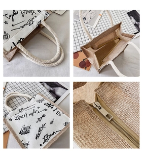 Detail view of linen tote bag with cotton rope handles and internal zipper pocket