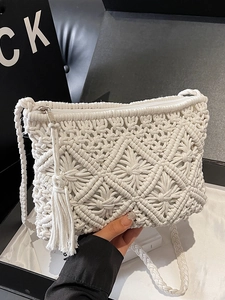 Handmade white macrame straw shoulder bag with fringe tassel for beach vacation