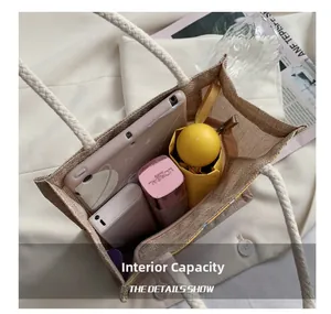 Interne capaciteit van de grote canvas tas met tablet, paraplu en cosmetica