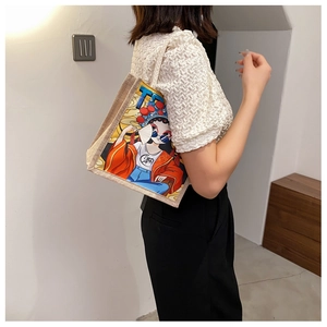Detail of canvas tote bag featuring traditional Chinese opera cartoon and braided texture
