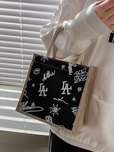 Graffiti print canvas lunch bag with cotton rope handle and black linen patchwork design