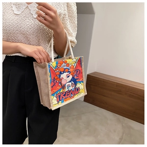 Detail of canvas lunch bag with cartoon Peking Opera print and woven rope handles